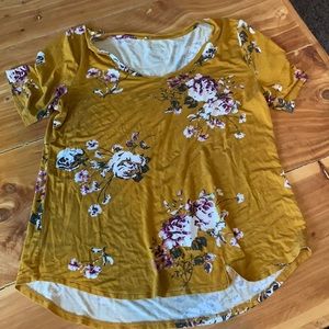 Maurices size large mustard tee with floral design.